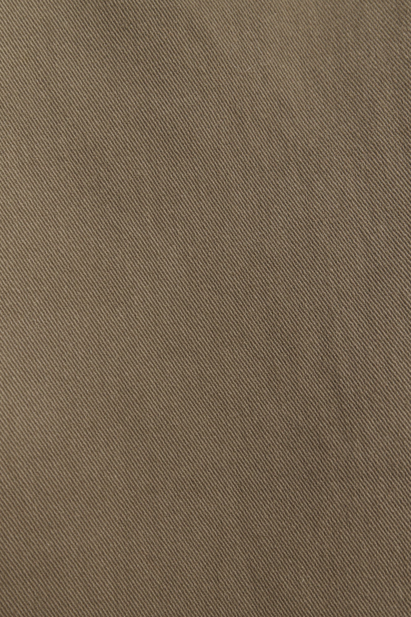 Gigi | La veste verte asymétrique sans manches