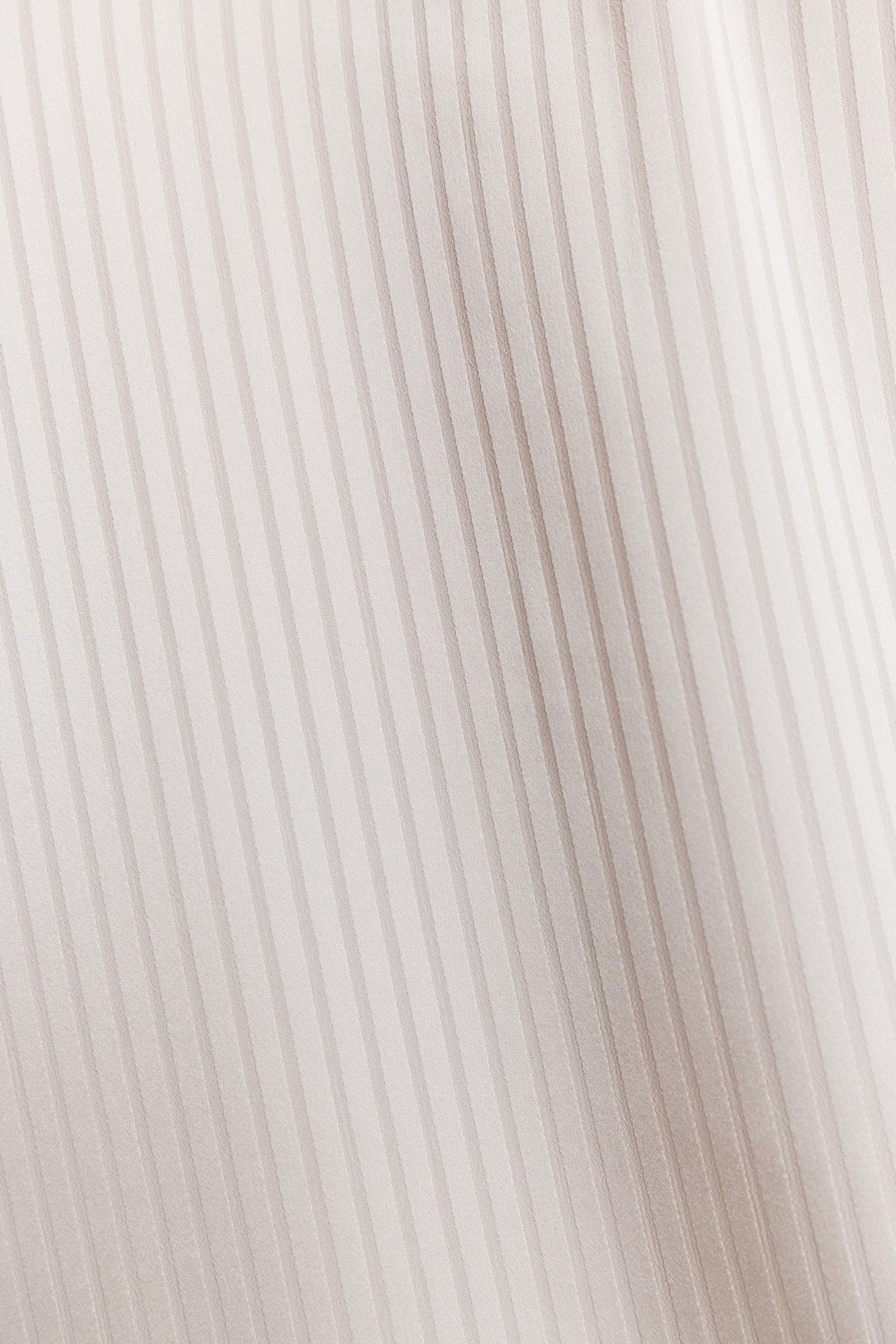 Kalzo | Sleeveless blouse with bow in ivory