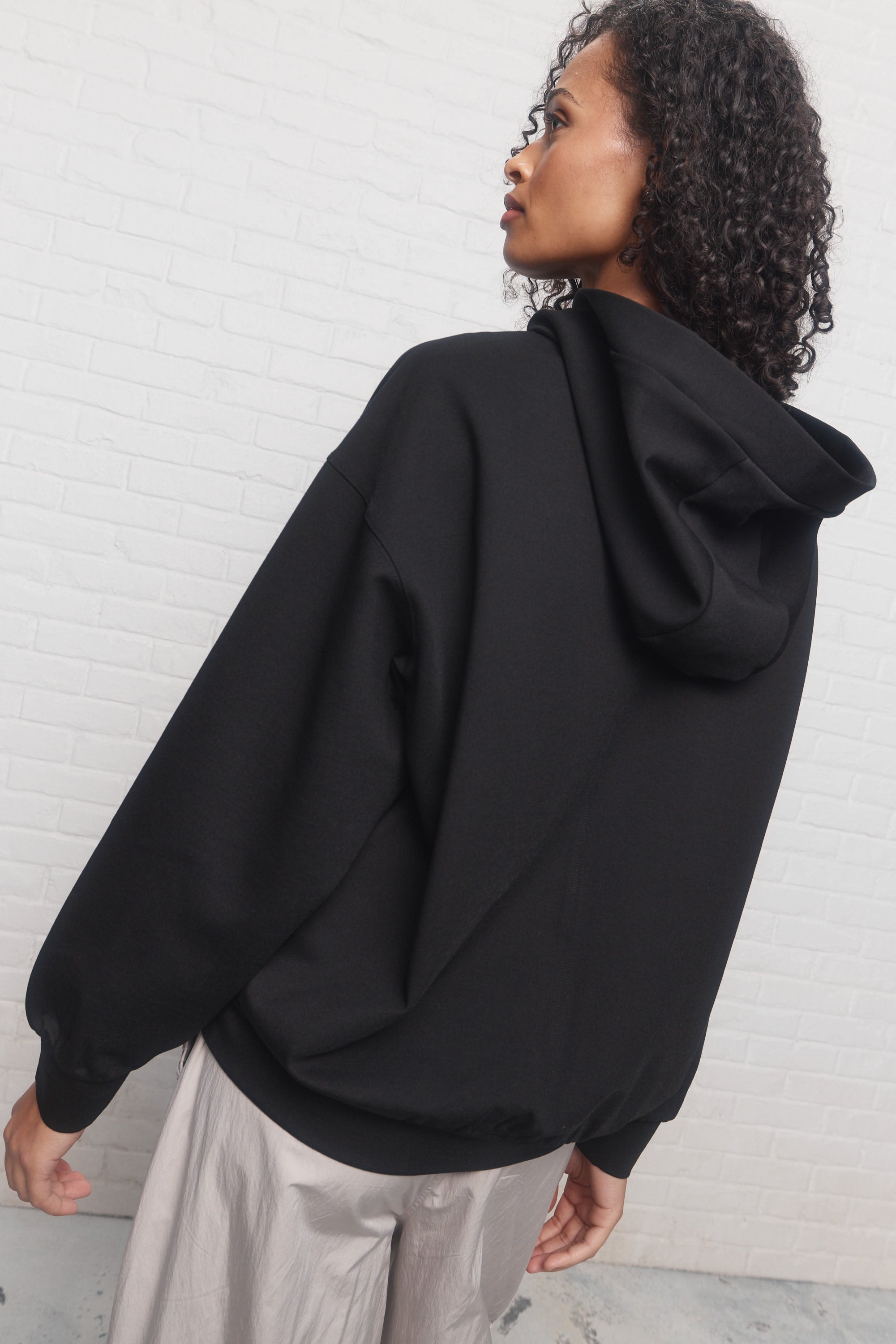 Melina | Black hooded sweater