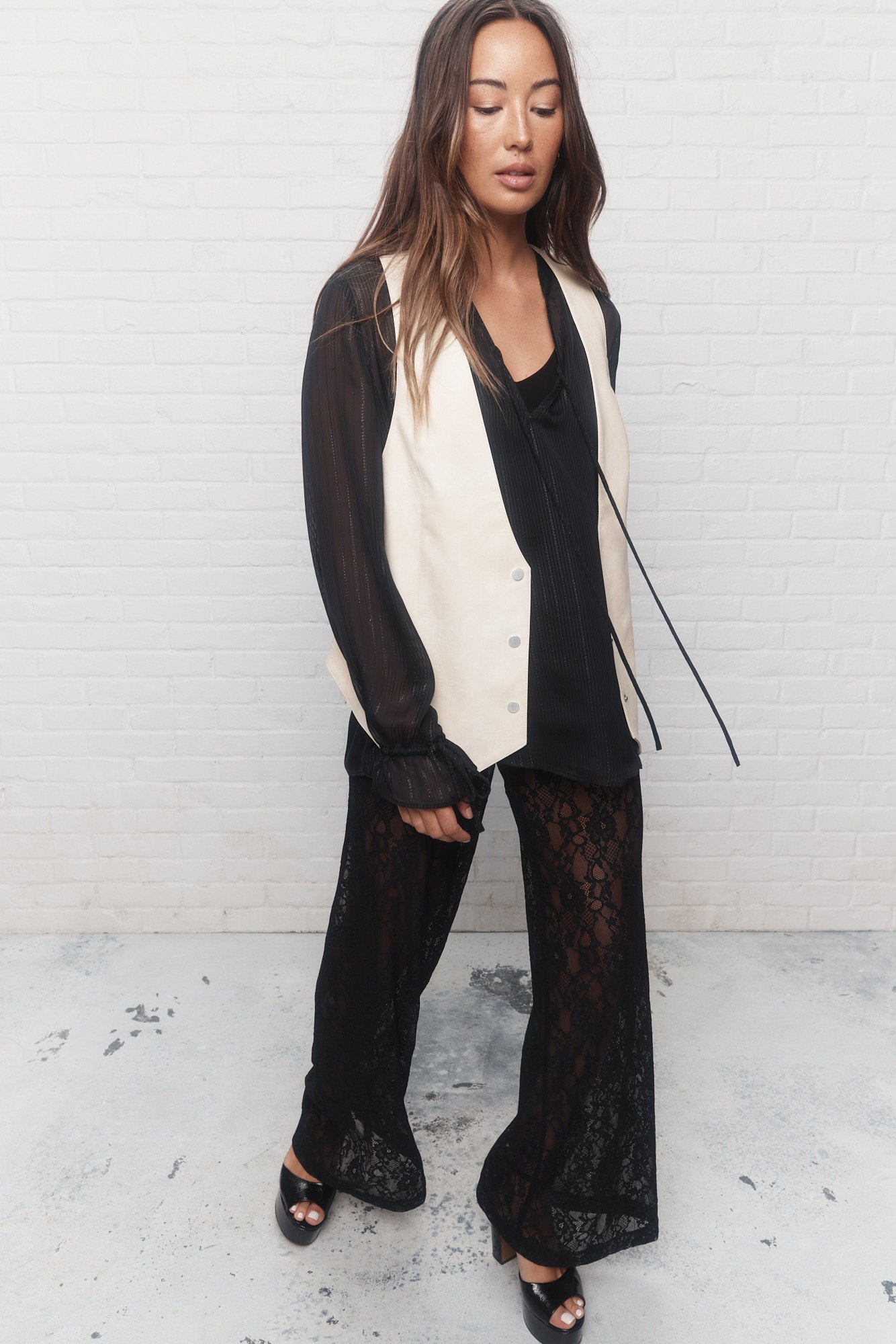 Jane | Cream faux leather sleeveless jacket