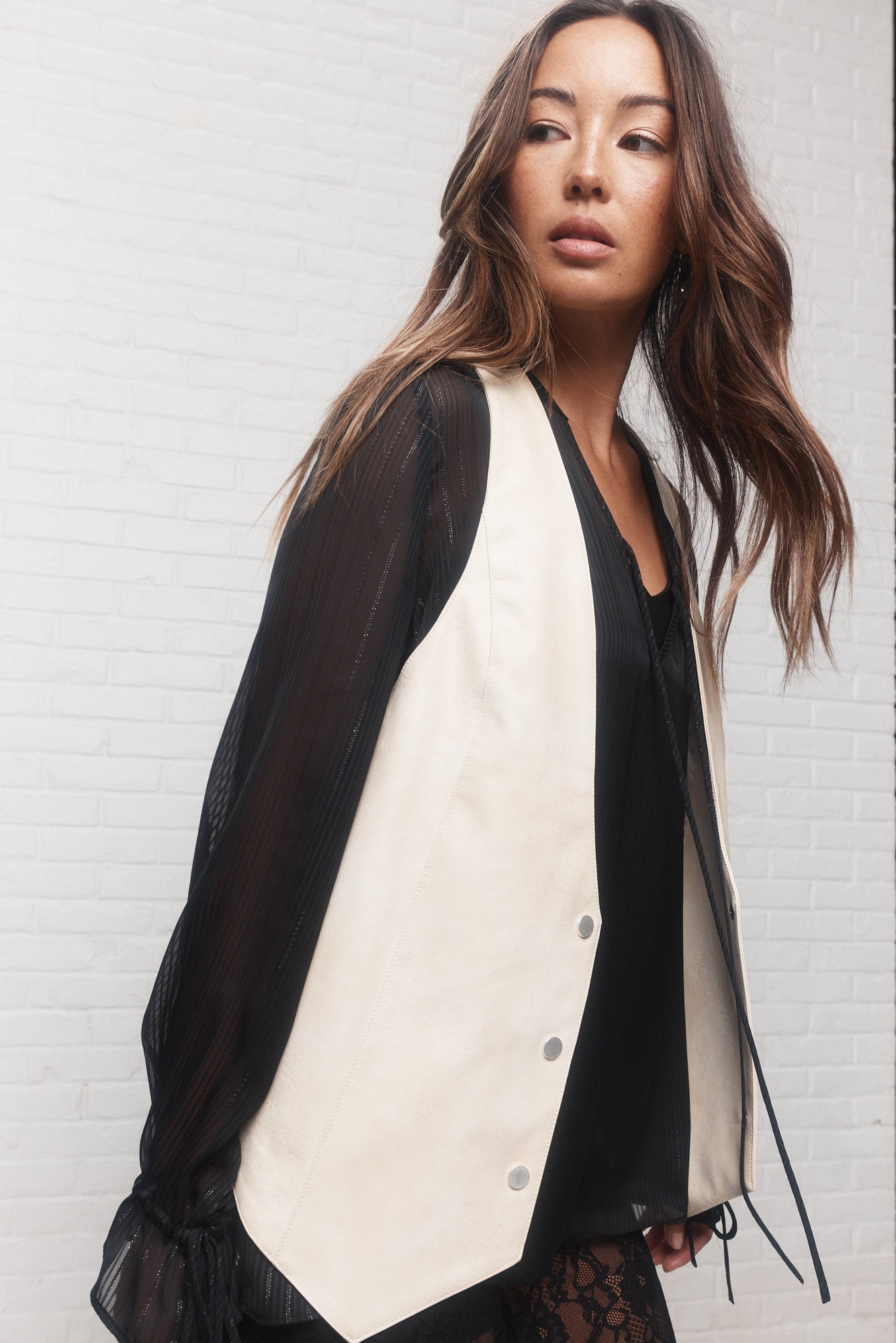 Jane | Cream faux leather sleeveless jacket