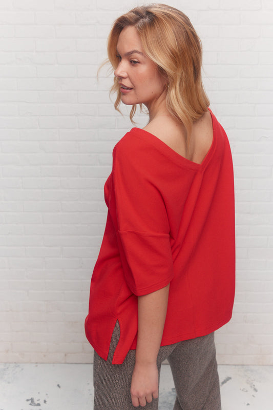 Loose red sweater with plunging V back | Cerla