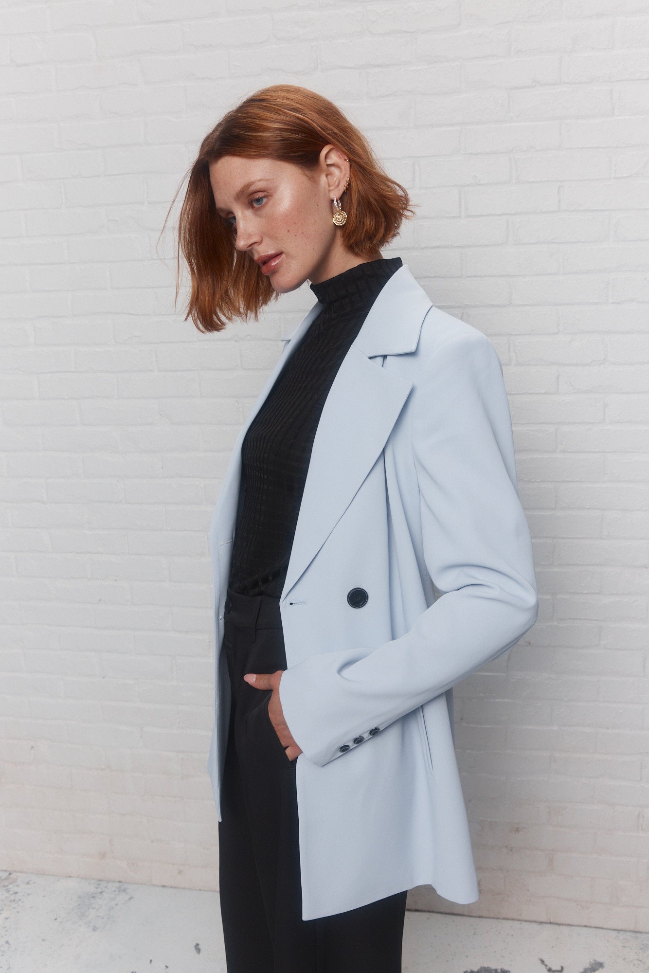 Loose, double-breasted pale blue jacket | Marta