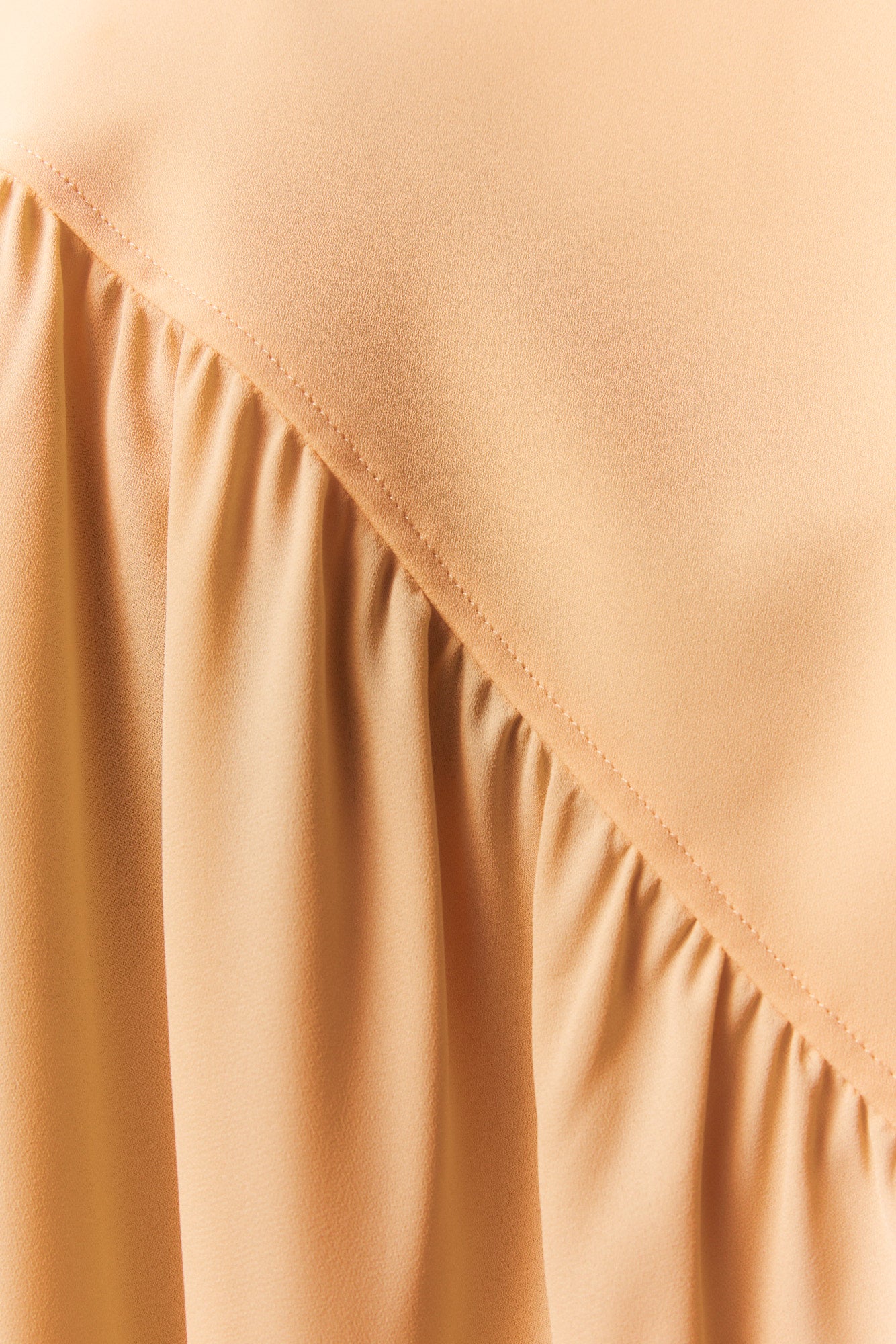 Loose asymmetrical apricot shirt | Victorian