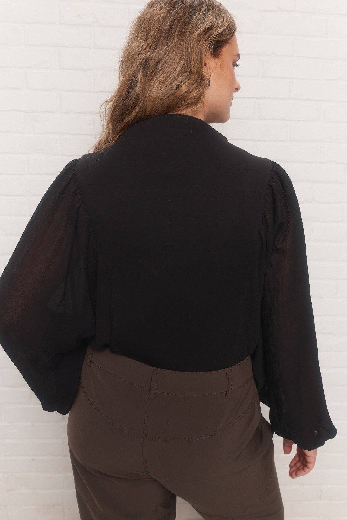Nova | Black sweater with transparent sleeves