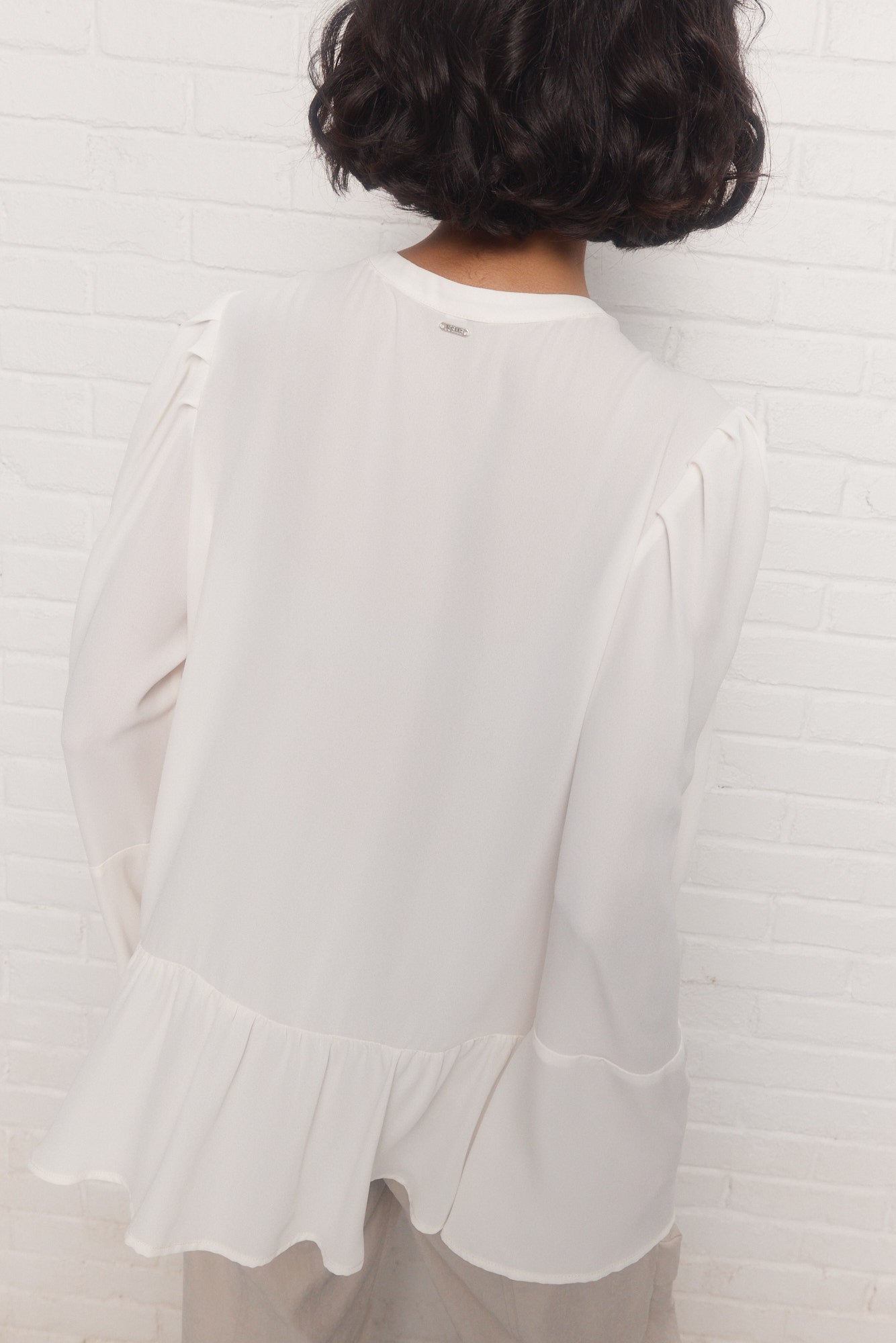Loki | Blouse crème à volants