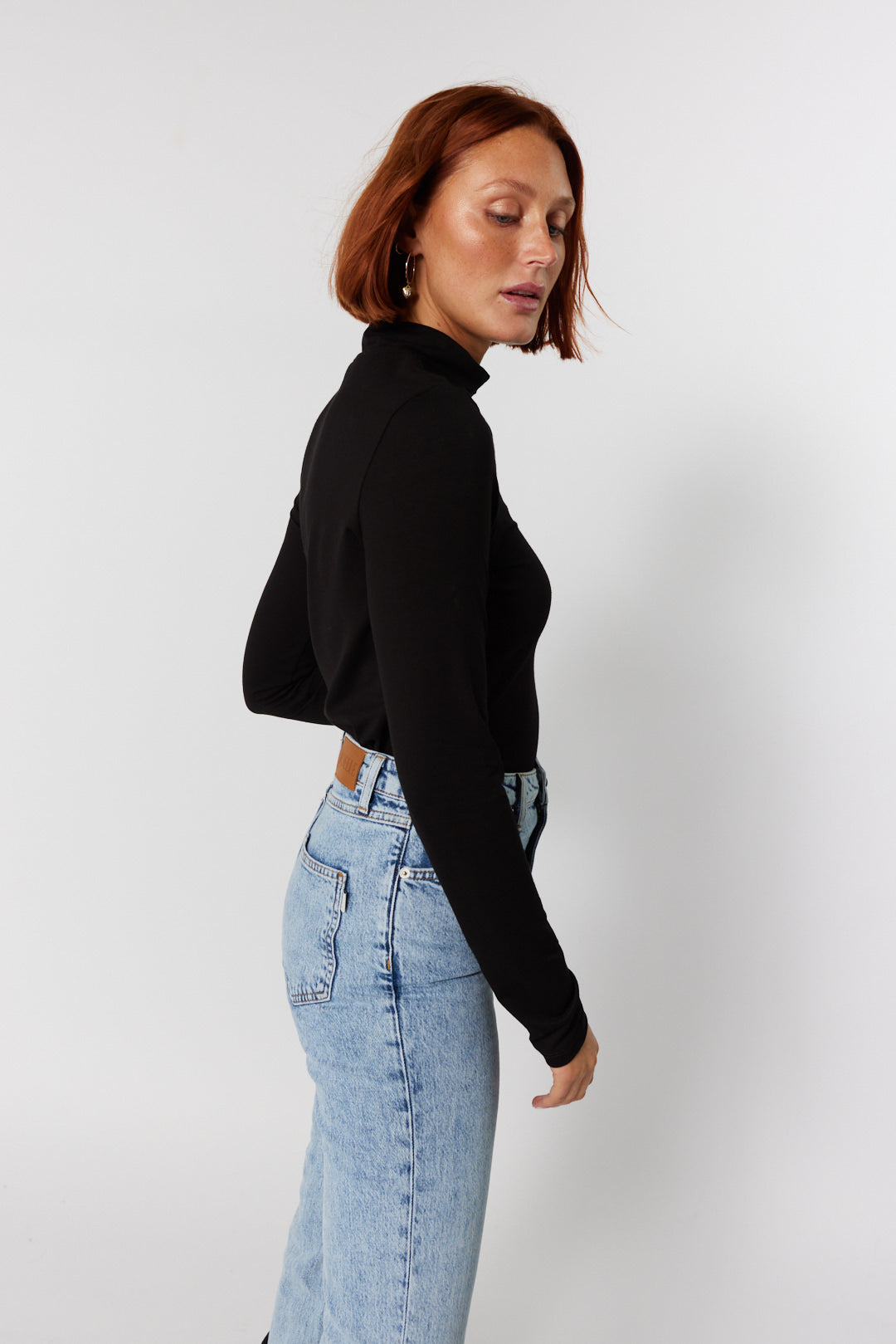 Black turtleneck sweater | Roulade