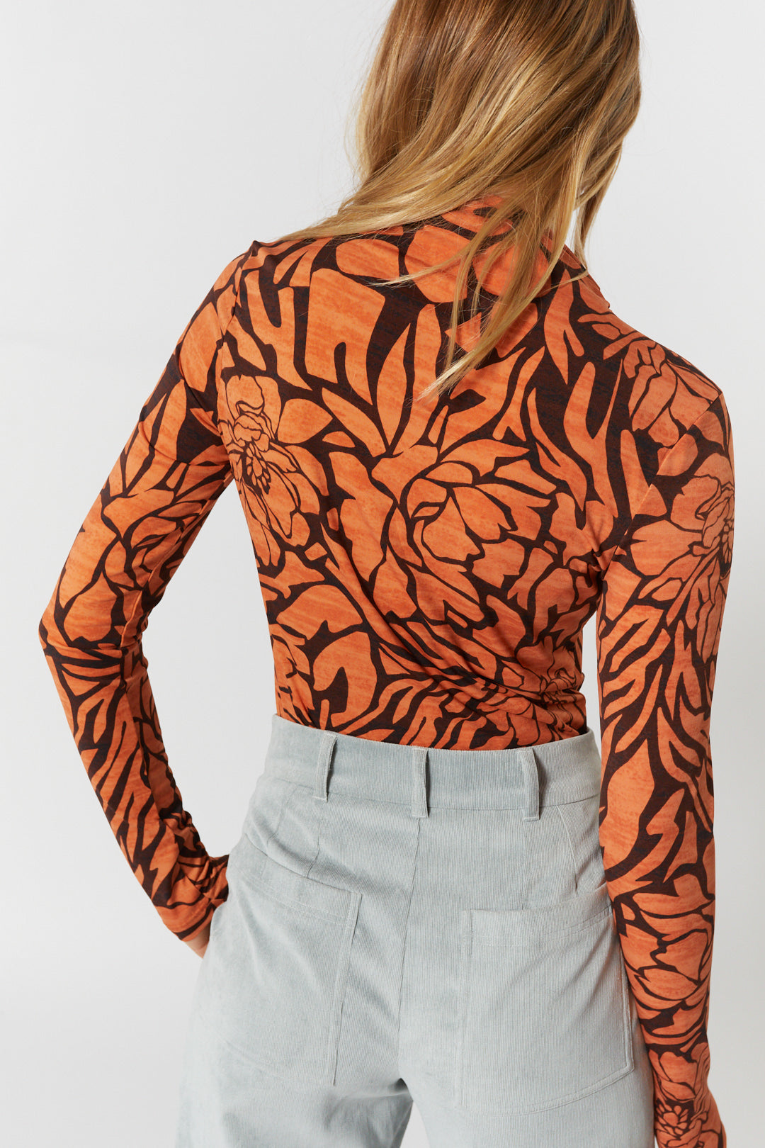 Orange floral patterned sweater | Nolan