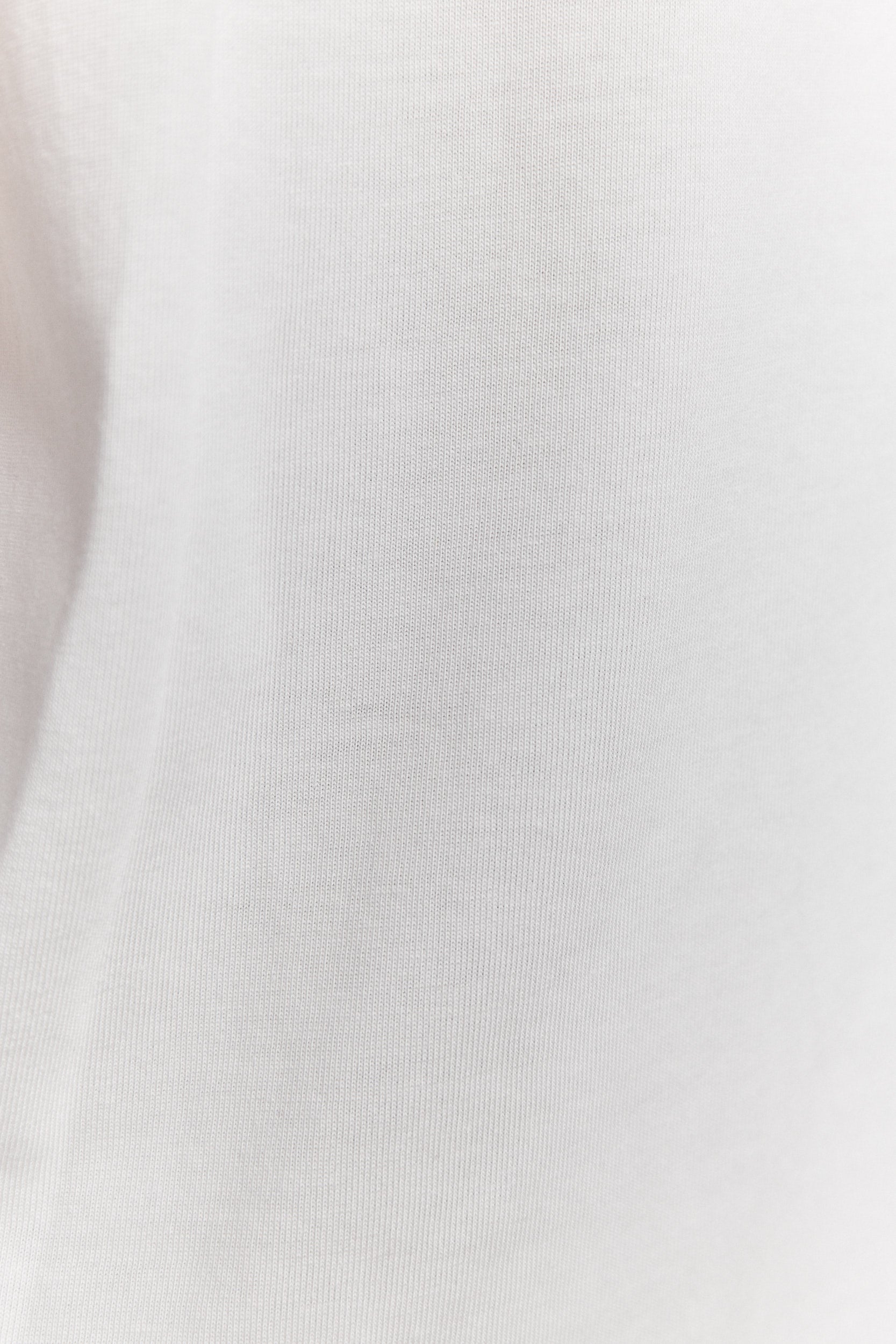 Slater | Oversized white T-shirt with rolled sleeves