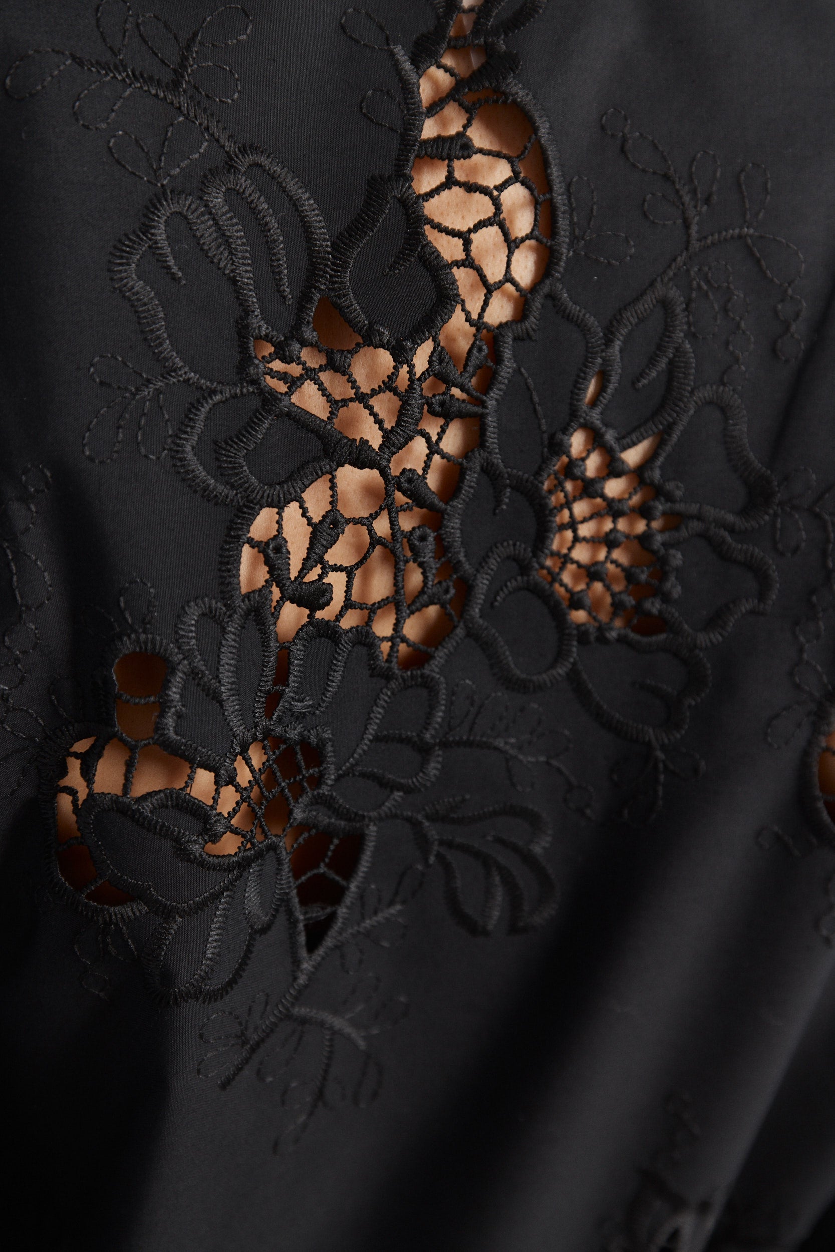Supernova | Embroidered black shirt with openwork details