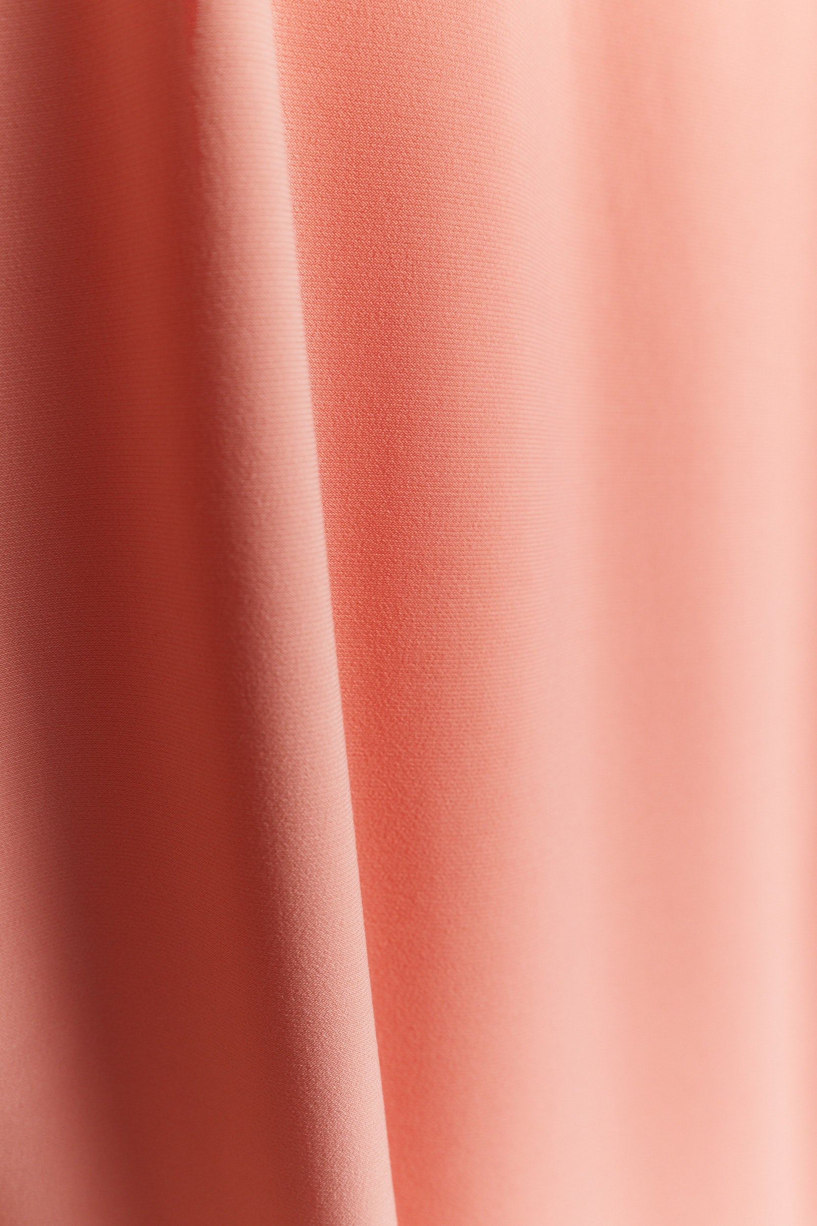 Flo La robe corail à col en V JOELLE Collection