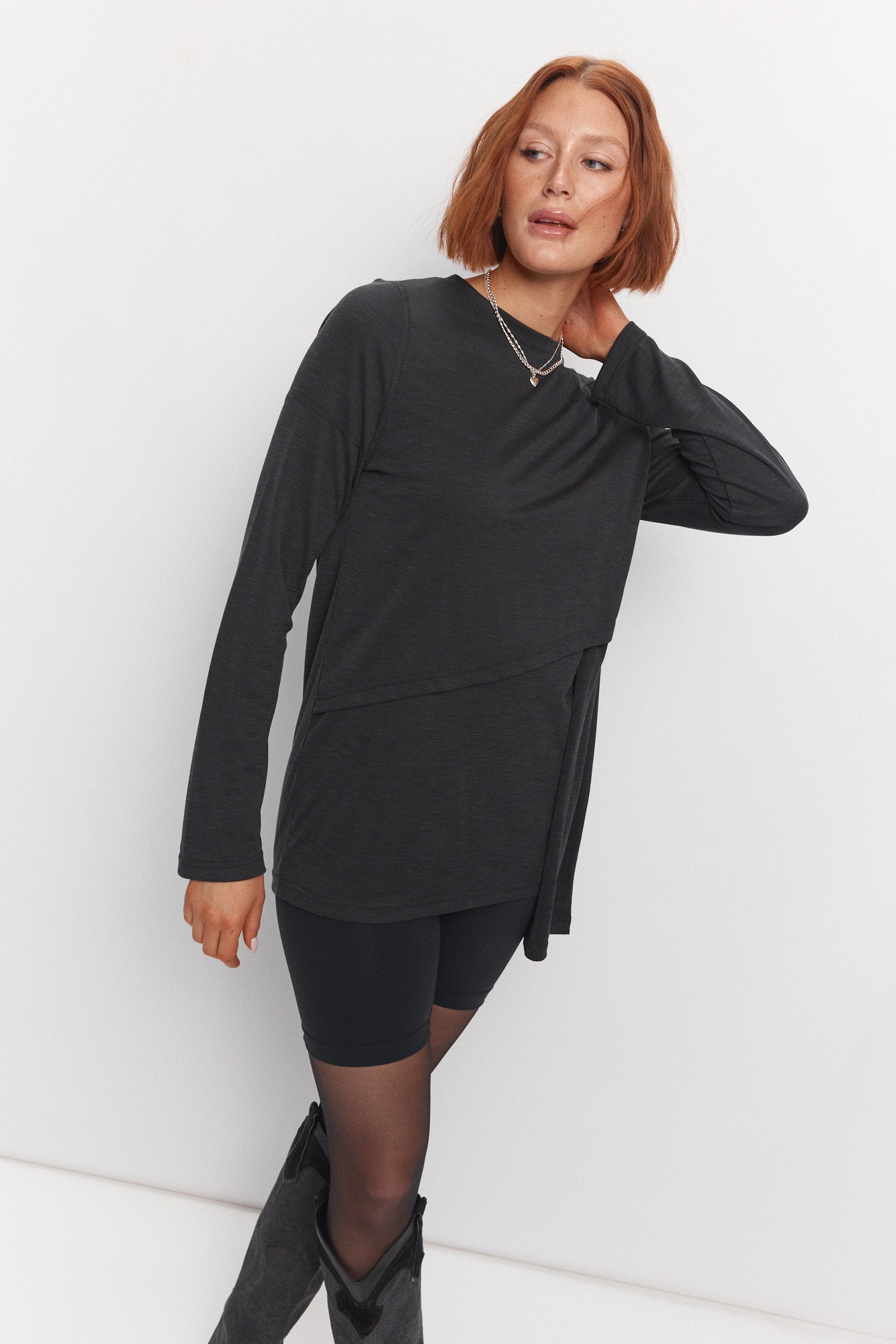 Black sweater with asymmetrical inserts | Earth